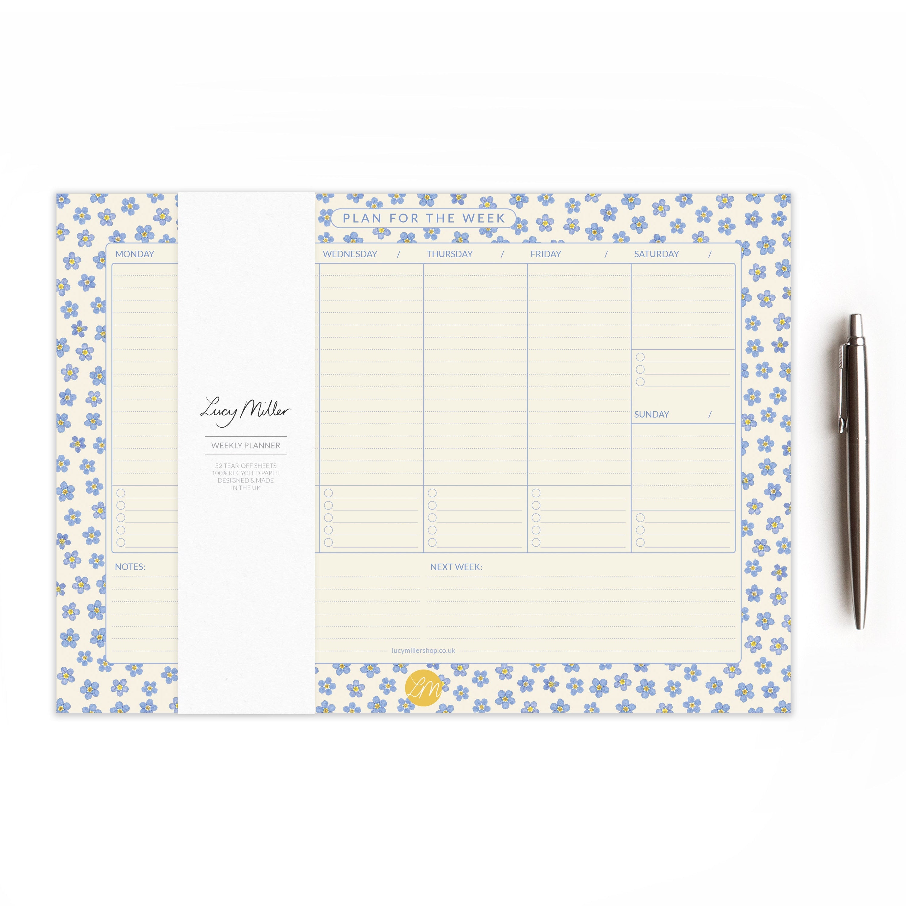 Weekly planner with pressed forget-me-not flowers border on a white background and styled with a pen
