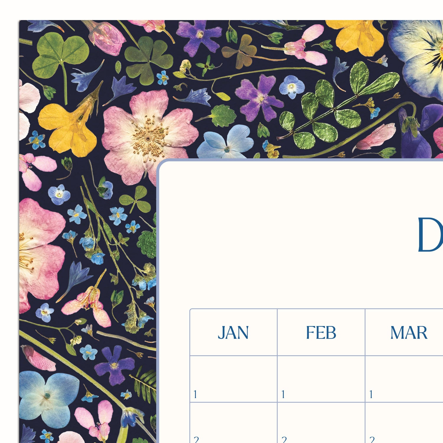 Close-up of perpetual calendar featuring delicate pressed flowers and a timeless design, bringing nature indoors for year-round inspiration. Perfect for displaying in a home office, studio or kitchen and inspiring nature appreciation daily.