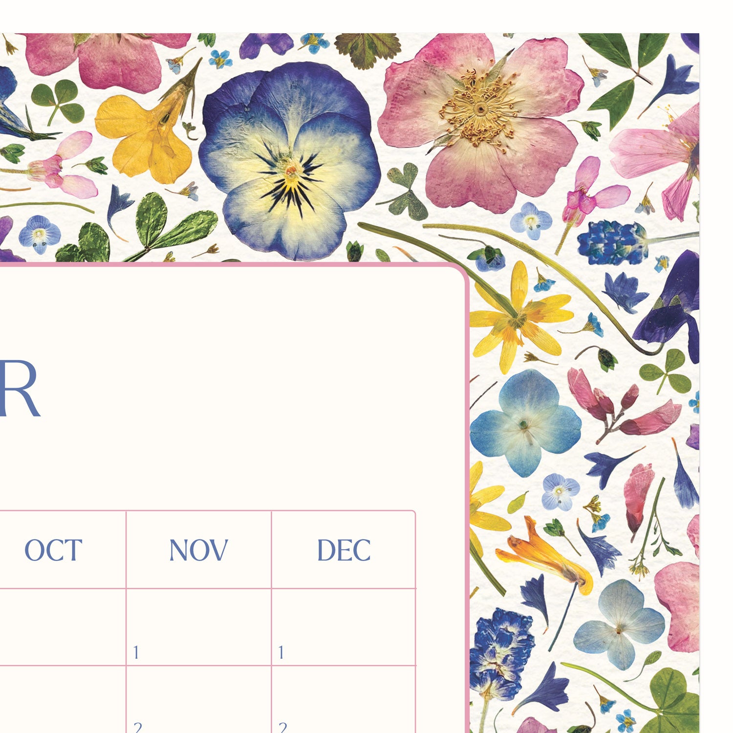 Close-up of perpetual wall planner with a botanical pressed flower design, ideal for nature lovers and sustainable living advocates seeking year-round date reminders.