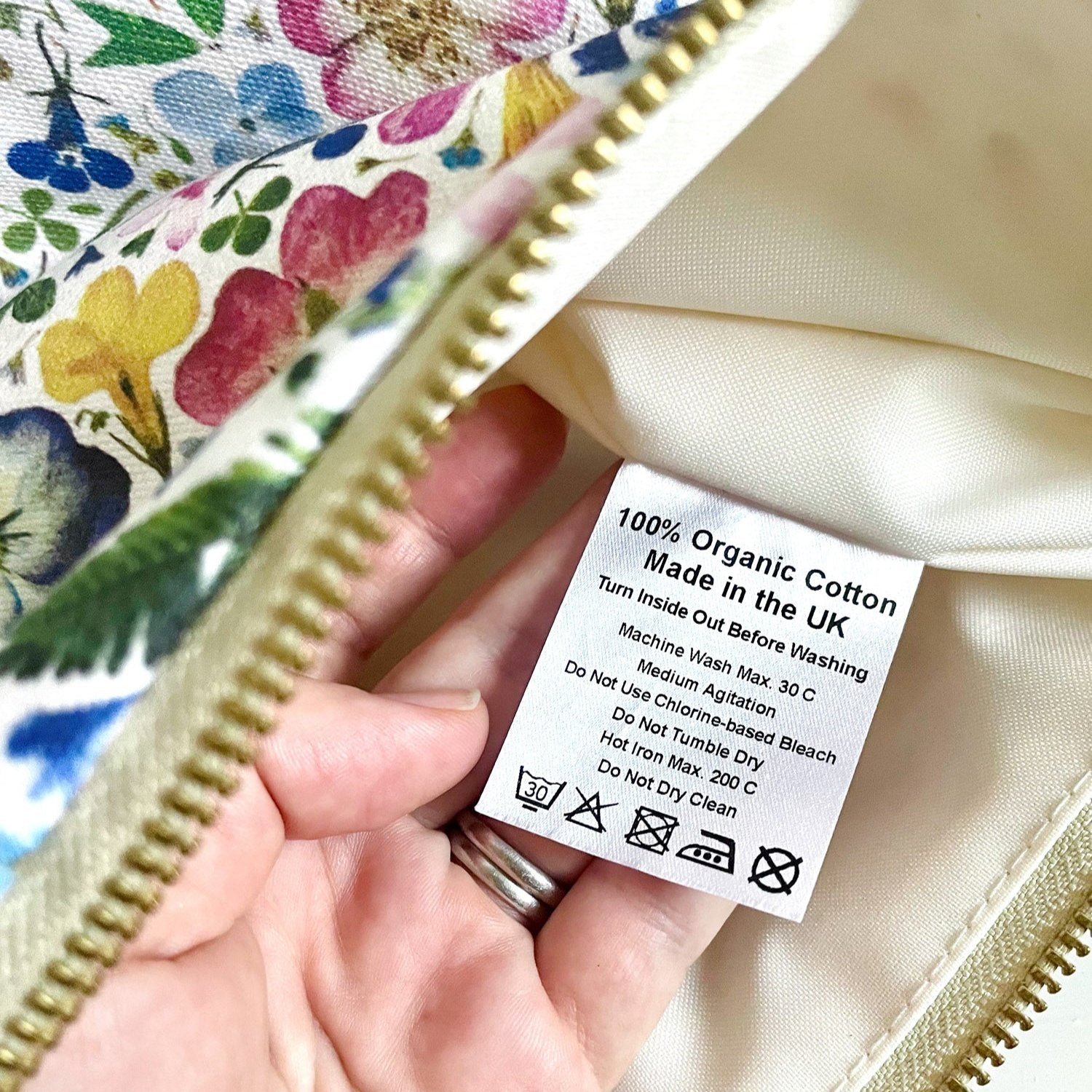 Care Instruction Label in Organic Cotton Wash Bag, Floral Print and Waterproof Lining