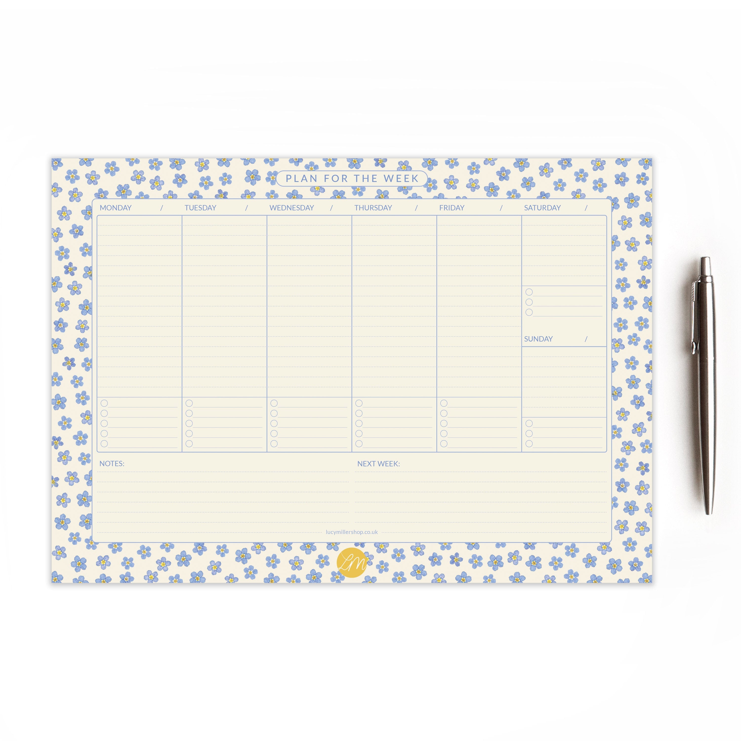 Weekly planner with pressed forget-me-not flowers border on a white  background and styled with a pen
